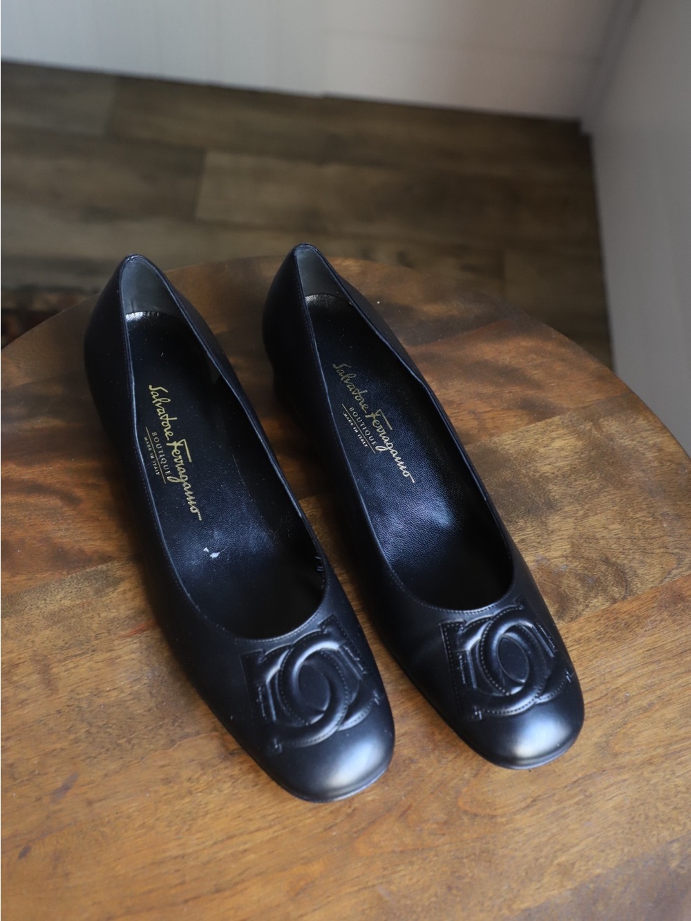 Salvatore Ferragamo Black Leather Embossed Logo Flats
